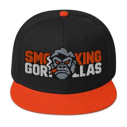 SMOKING GORILLAS - Snapback Cap in Schwarz/Orange – Vorderansicht mit gesticktem Teamlogo